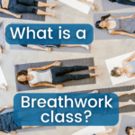 breathwork class of students laying on yoga mats breathing